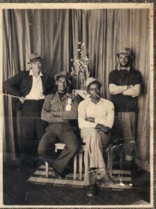 Trawling in Walvis Bay, 1940s.  Tony’s father standing on the right with his arms folded