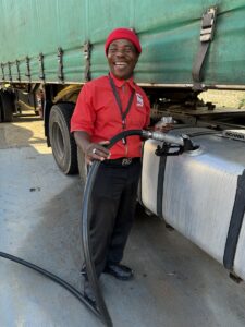 Johnson Masinga is the best-read pump attendant you’ll meet. Probably the most cheerful too!