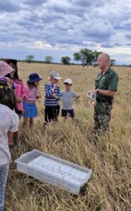 Riaan van Zyl teaching ing in the bush